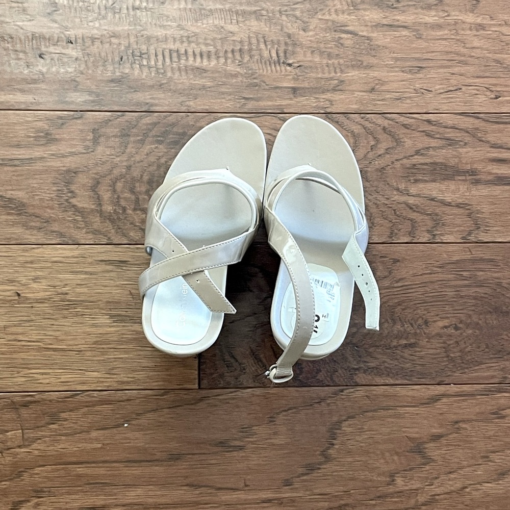 Beige patent wedges